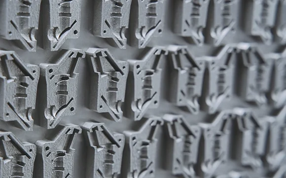 Close-up of densely nested metal parts printed on the Farsoon FS273M LPBF 3D printer