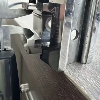 3D printed inspection gauge measured with a digital caliper during aerospace QC development