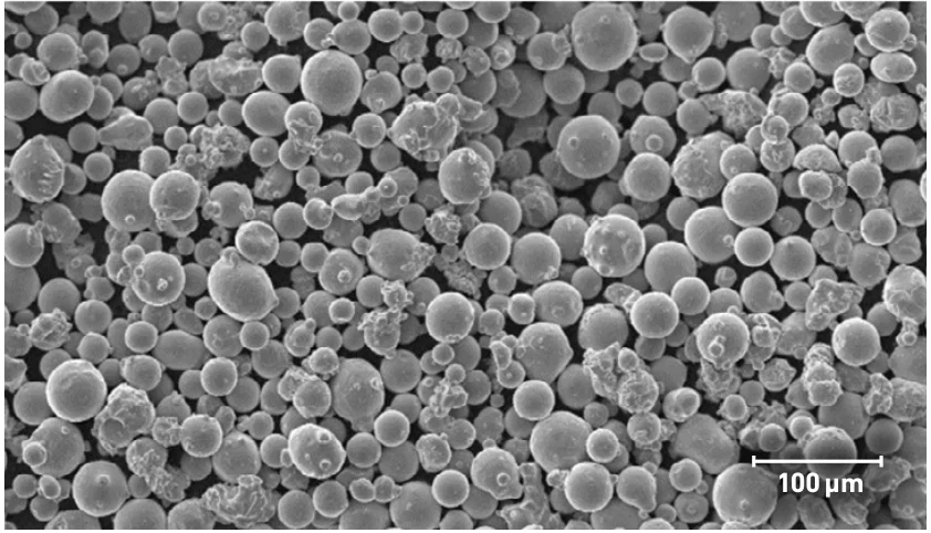 SEM image of typical PowderRange X powder, from the Carpenter Additive datasheet; scale bar 100 µm.