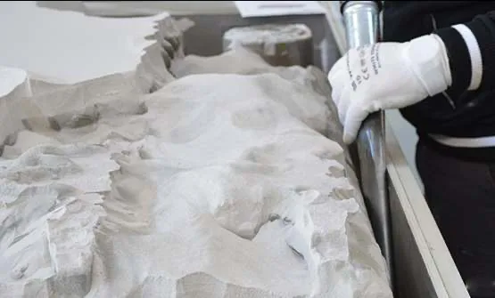 Delfin ATEX vacuum in use collecting metal powder at a 3D printer