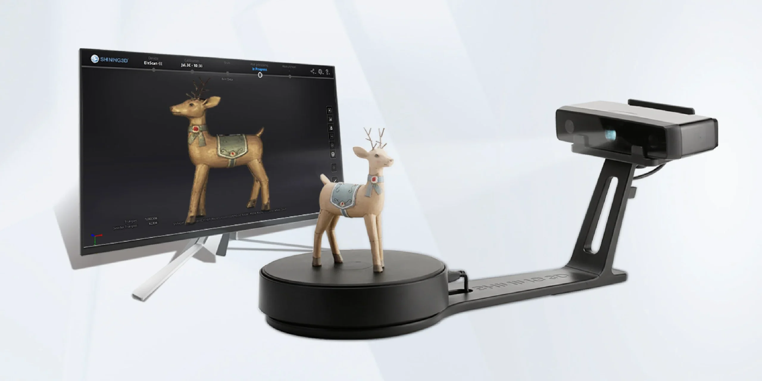EinScan SE V2 with auto turntable capturing a small figurine