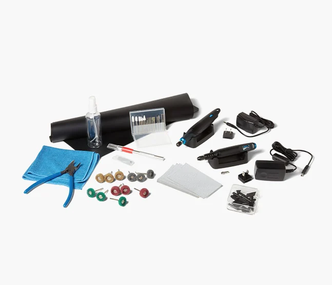 Formlabs Finishing Tools kit contents — pen sander, rotary tool, bits, cutters, and silicone mat