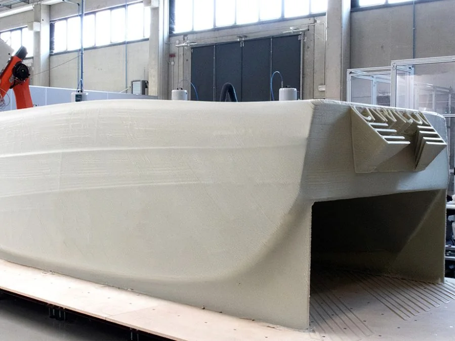 Large 3D-printed boat hull produced on Caracol Heron AM