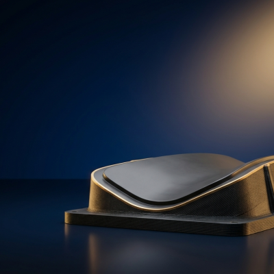 Large format 3D printing banner: printed composite layup tool on a navy studio background with gold glow
