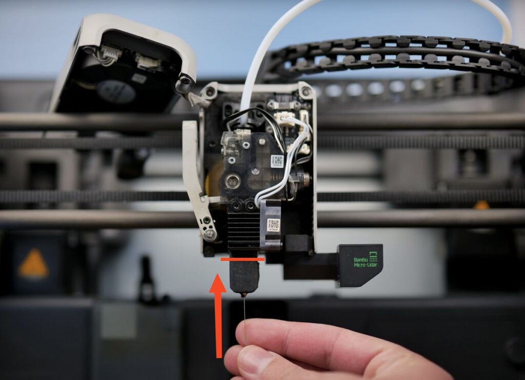 push the pin to unclog the hotend Additive Plus How to Clean a 3D Printer Nozzle