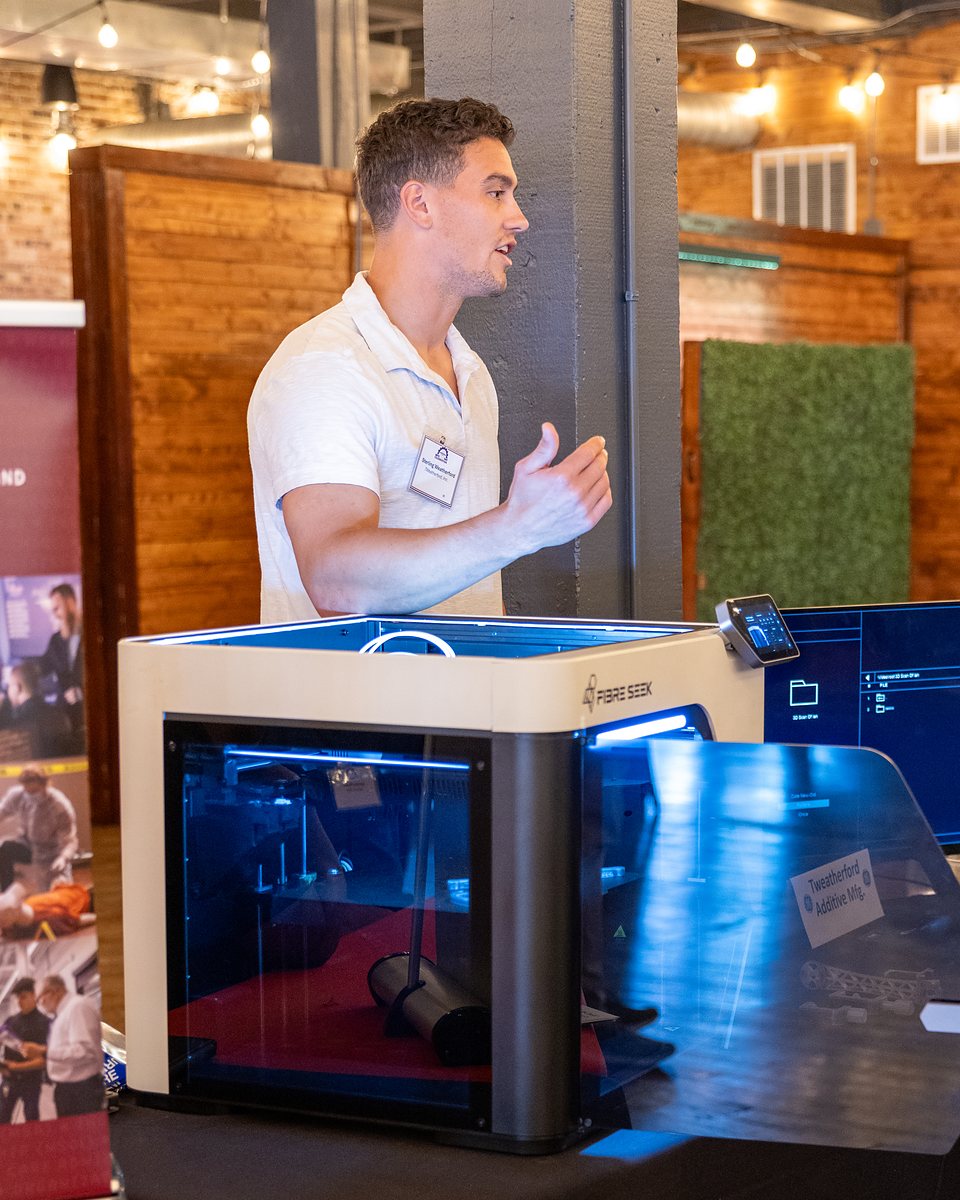 Sterling demonstrating the FibreSeeker 3 continuous carbon fiber 3D printer